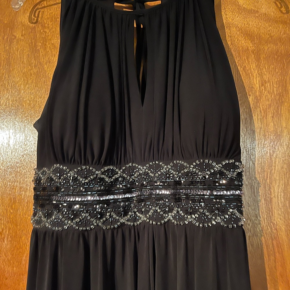 Beaded black special occasion dress.